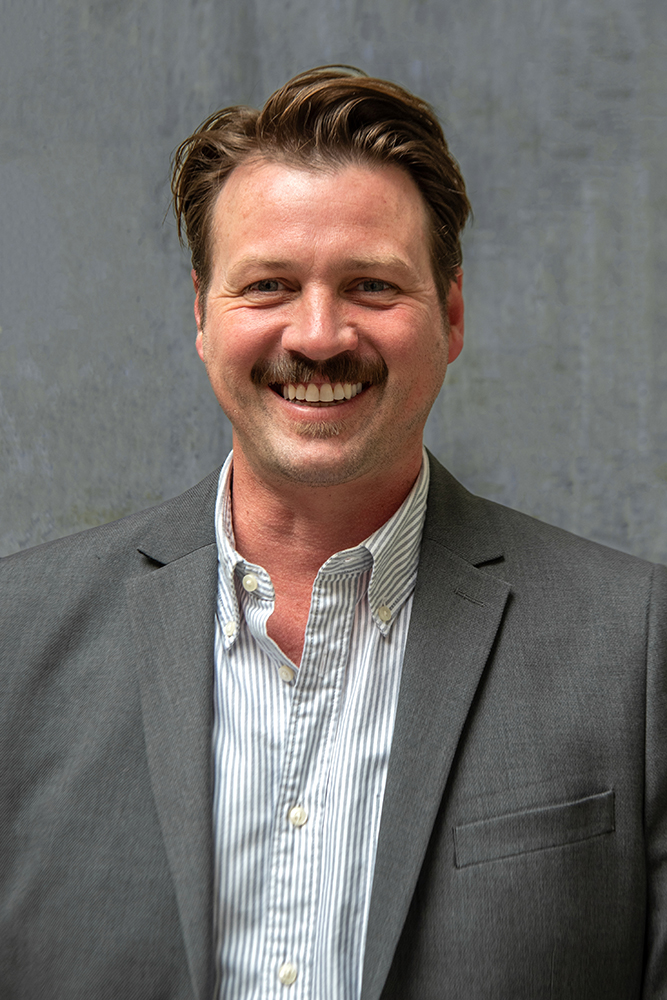 Headshot of Andrew Greene